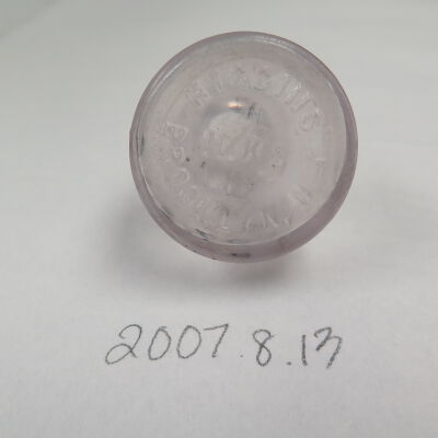 Bottom of inkwell.: Origsize: 2" (h) x 1.5" (dia); Origformat: Artifact