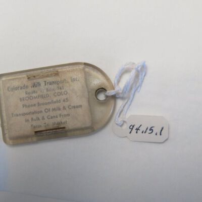 Back of keychain: Origsize: 2" (w) x 1" (l); Origformat: Artifact