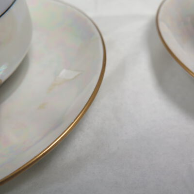 Close up of saucers.: Origsize: 2.25"(h) x 4" (w) x; Origformat: Artifact