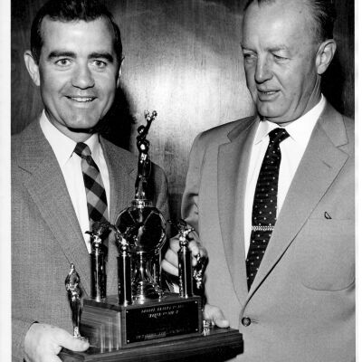 Casler and Morgan with a Trophy at the Speach Award