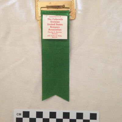 Back of ribbon.: Origsize: 6"(H) x 1.25"(W); Origformat: Artifact