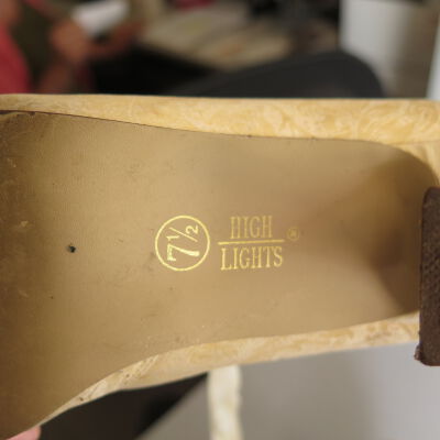 Bottom of shoe: Origsize: 9" (h) x 3" (w) x 5"; Origformat: Artifact