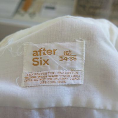 Tag in shirt: Origsize: 16.5" (w) x 34" (l); Origformat: Artifact