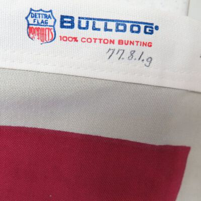 Close up of number on flag.: Origformat: Artifact