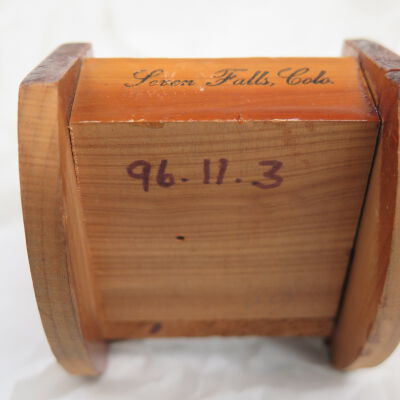 Bottom of pin cushion.: Origsize: 3" (h) x 3" (w) x 2.; Origformat: Artifact