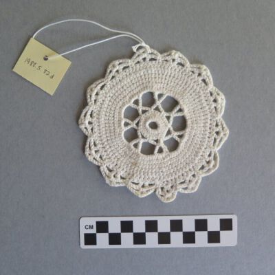 Doily and number of doily.: Origsize: 4.25" (diam); Origformat: Artifact