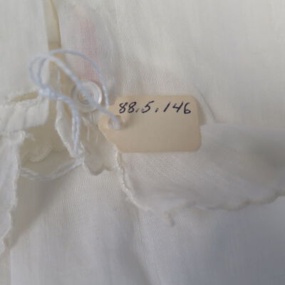 Number on dress.: Origsize: 9" (w) x 16" (l); Origformat: Artifact