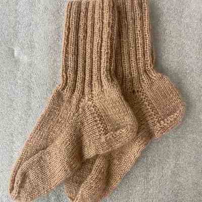 Pair of hand knitted socks