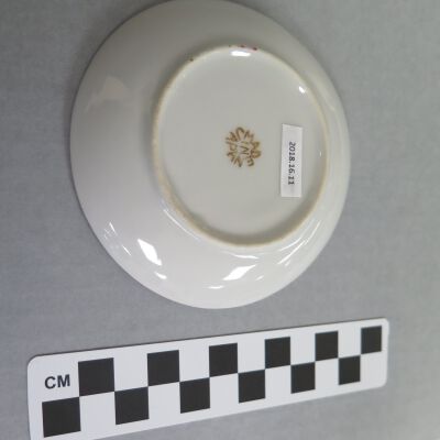 Bottom of saucer.: Origformat: Artifact