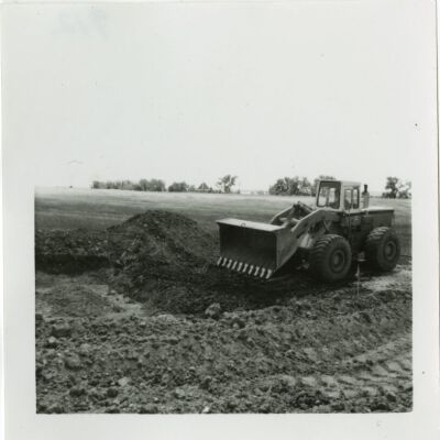 Bulldozer at new Broomfield train depot site, 1976: Origsize: 3.5" x 3.5"; Origformat: Print-Photographic; Resolution: 1500dpi