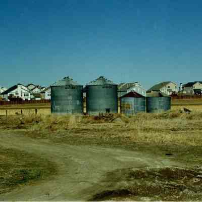 Four metal silos on Brunner property