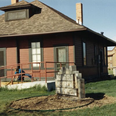 Man Doing Planting Work at the Broomfield Depot Museum