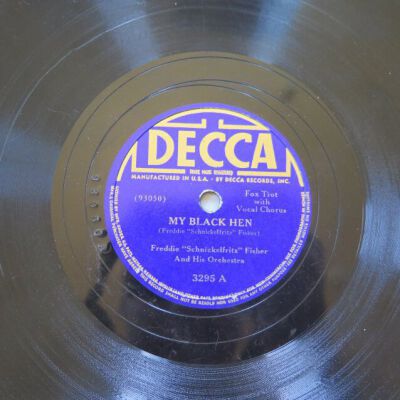 Close up of label on A side of record.: Origsize: 9.75" (diam); Origformat: Artifact