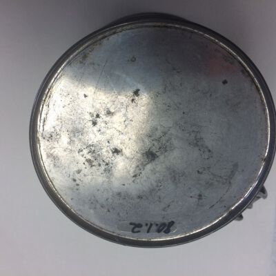Bottom of tin cup.: Origsize: 3" (h) x 5" (w); Origformat: Artifact