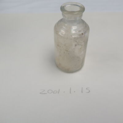 Side of bottle.: Origsize: 3.5" (h) x 1.75" (di; Origformat: Artifact