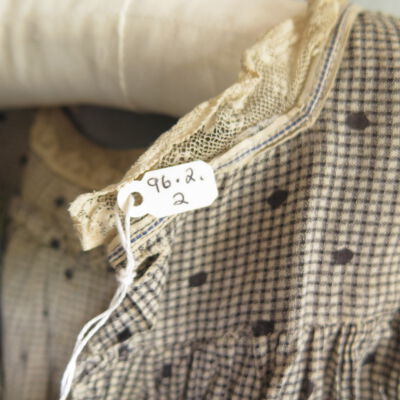 Number of dress: Origsize: 18" (w) x 19" (l); Origformat: Artifact