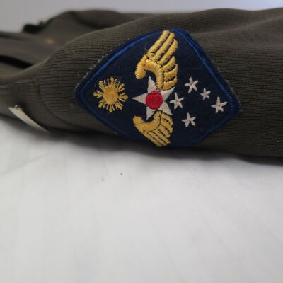 Patch on one shoulder.: Origsize: 16" (w) x 31" (l); Origformat: Artifact
