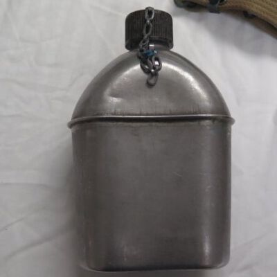 Back of canteen showing lid and chain: Origformat: Artifact