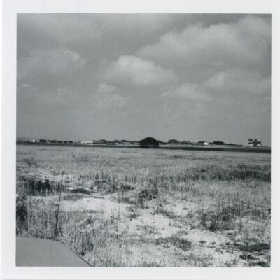 Filed overlooking the Broomfield train depot at its relocation site, 1976: Origsize: 3.5" x 3.5"; Origformat: Print-Photographic; Resolution: 1500dpi