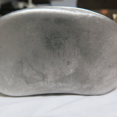 Bottom of canteen showing engraving: Origformat: Artifact