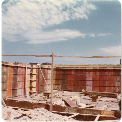 Construction of new foundation for the Broomfield train depot, 1976: Origsize: 3.5" x 3.5"; Origformat: Print-Photographic; Resolution: 1500dpi