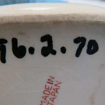 Bottom of cream pitcher: Origsize: 3" (h) x 7" (w) x 4.; Origformat: Artifact