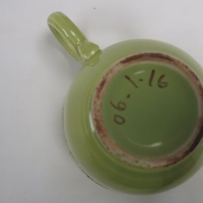 Bottom of cup.: Origsize: 3" (h) x 4.5" (w) x; Origformat: Artifact