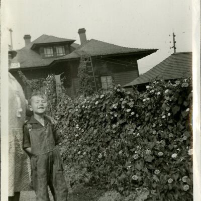 Robert Hillen and Jeannie Hillen by Clematis flowers, circa 1928: Origsize: 3 1/2" x 5 1/2"; Origformat: Print-Photographic; Resolution: 300dpi