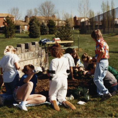 Photographs of Children Planting Flowers at the Broomfield Depot Museum