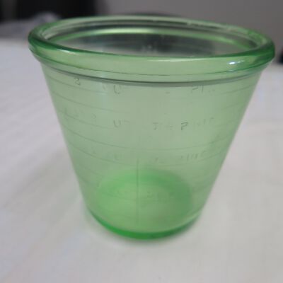 Side of green glass jar.: Origsize: 11.5" (h) x 4.5" (di; Origformat: Artifact