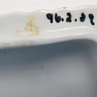 Bottom of lid.: Origsize: 3" (h) x 8" (w) x 5.; Origformat: Artifact