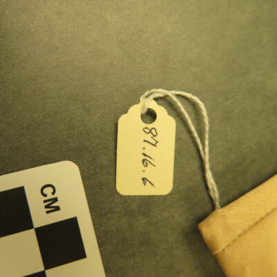 Close up of number on gloves.: Origsize: 7.5" (w) x 3.5" (l); Origformat: Artifact