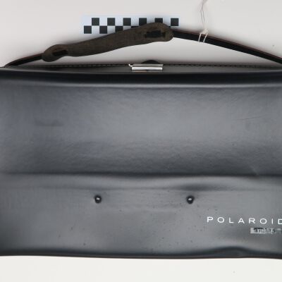 Back of camera case.: Origsize: 14" (w) x 8.5" (l) 3; Origformat: Artifact