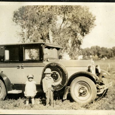 Siblings Rose Hillen and Robert Hillen by a Davis automobile, 1926: Origsize: 3" x 5"; Origformat: Print-Photographic; Resolution: 300dpi