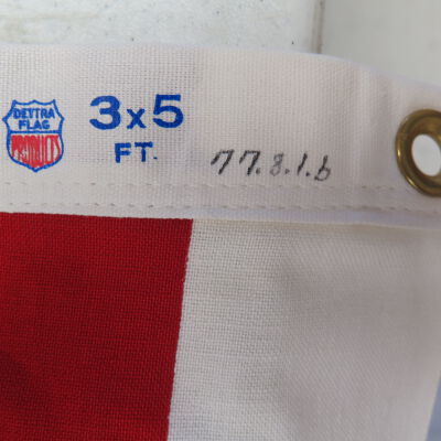 Close up of number on flag.: Origformat: Artifact
