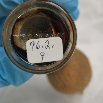 Bottom of perfume bottle.: Origsize: 3.5" (h) x 3" (w) x; Origformat: Artifact