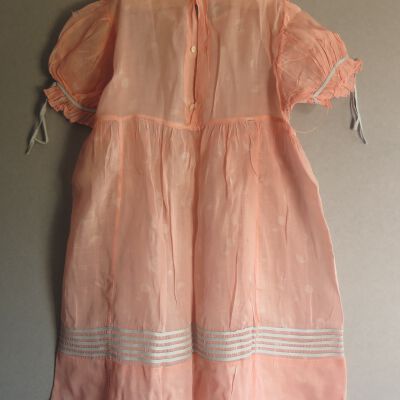 Back of dress: Origsize: 10" (w) x 24" (l); Origformat: Artifact