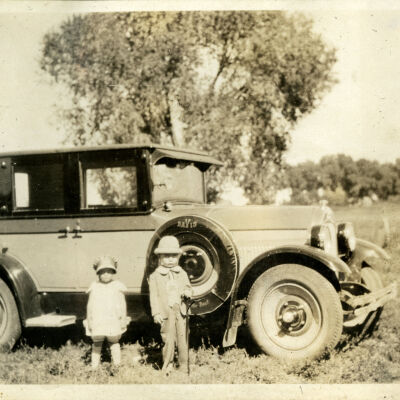 Siblings Robert Hillen and Rose Hillen by Their Grandfather's Davis Automobile
