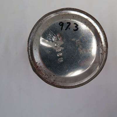 Bottom of tin.: Origsize: 5.25" (h) x 3" (dia); Origformat: Artifact