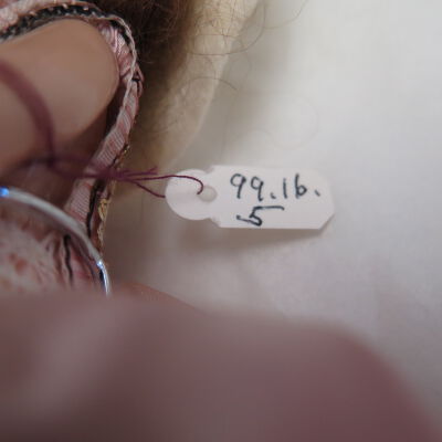 Number on doll.: Origsize: 10.75" (h) x 4" (w); Origformat: Artifact