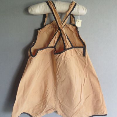 Back of romper: Origsize: 6" (w) x 15" (l); Origformat: Artifact