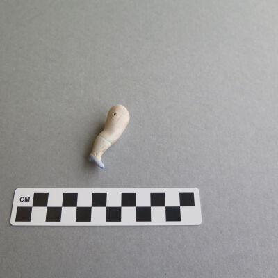 Other side of doll leg.: Origsize: 1" (h) x 1.5" (w) x; Origformat: Artifact