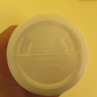Bottom of water bottle.: Origsize: 8" (h) x 3.5" (w); Origformat: Artifact