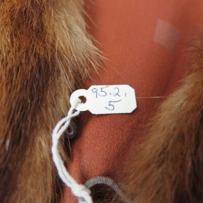 Close up of number on jacket.: Origformat: Artifact