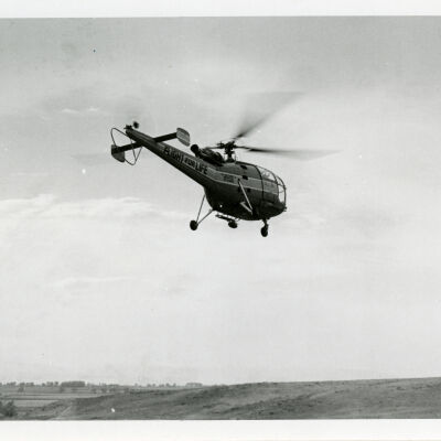 Flight for Life helicopter airborne near a car accident site, Highway 287