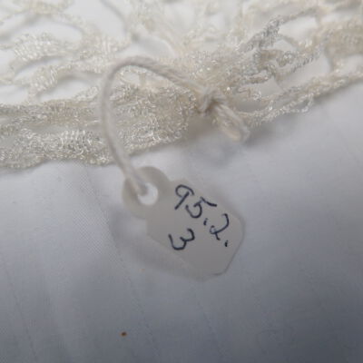 Number on scarf.: Origsize: 9" (w) x 56" (l); Origformat: Artifact