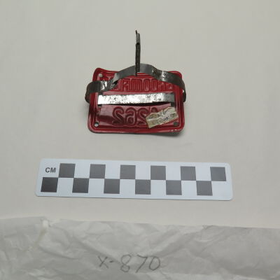 Back of license plate.: Origsize: 2" (h) x 3" (w) x 3"; Origformat: Artifact