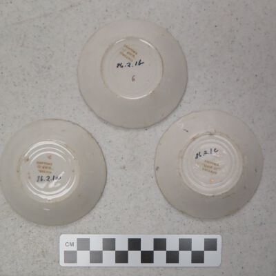 Underside with associated dishes.: Origsize: 3.25"(Dia); Origformat: Artifact
