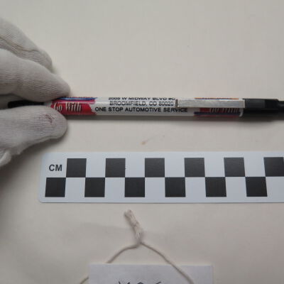 Close up of text on pen.: Origsize: 6" (l); Origformat: Artifact