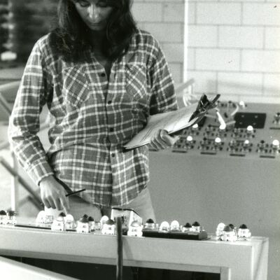 Woman at Control Panel